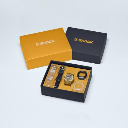 Casio G-Shock DWE-5600HG-1 Limited Edition Gold Chain Hip Hop Culture with interchangeable black and translucent band and bezel dw-5600