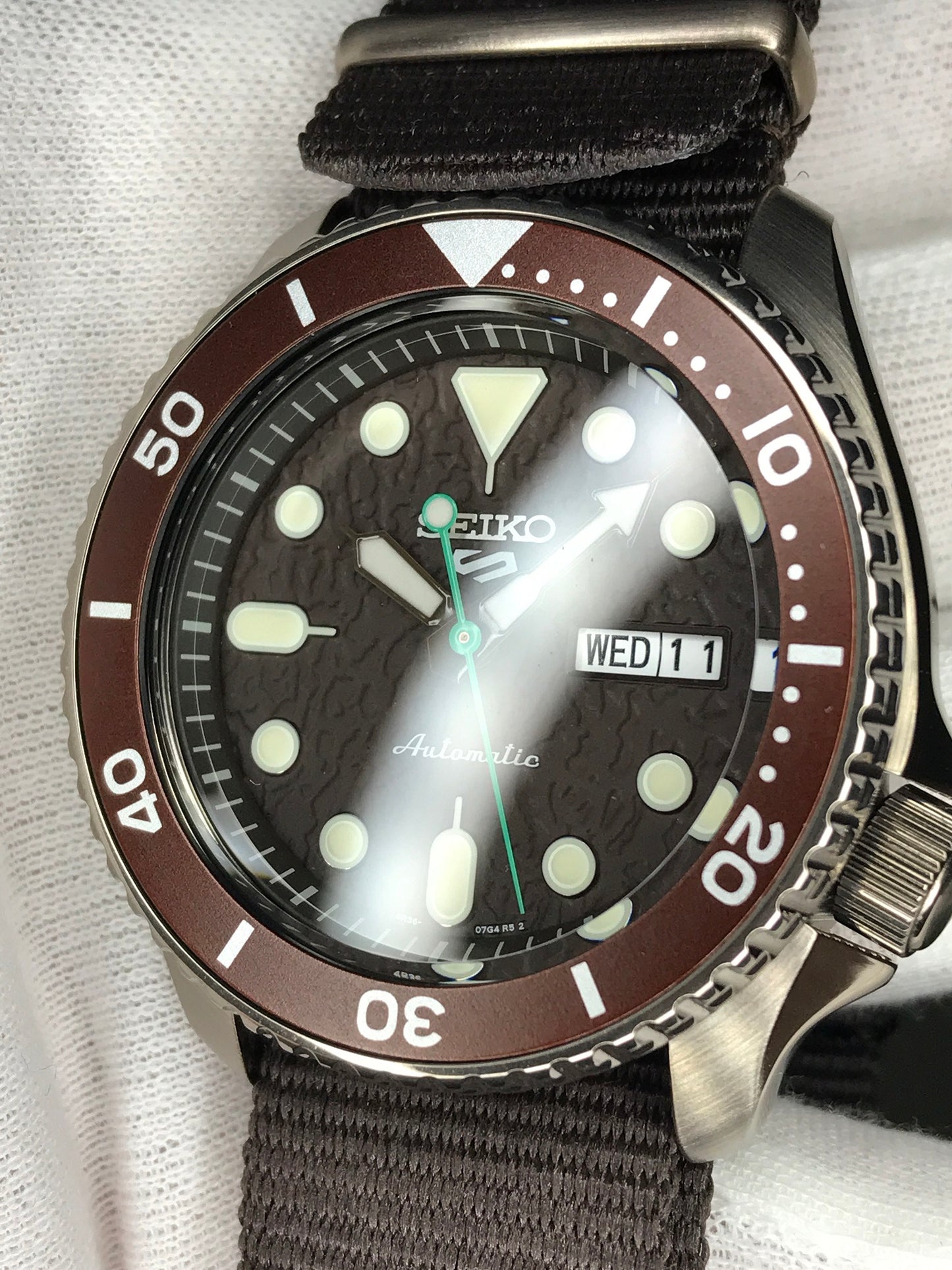 Seiko 5 Sports SRPD85K1 Automatic 100m Water Resistant Brown Dial Hard Coated Case Brown Nato Strap SRPD85 srpd85