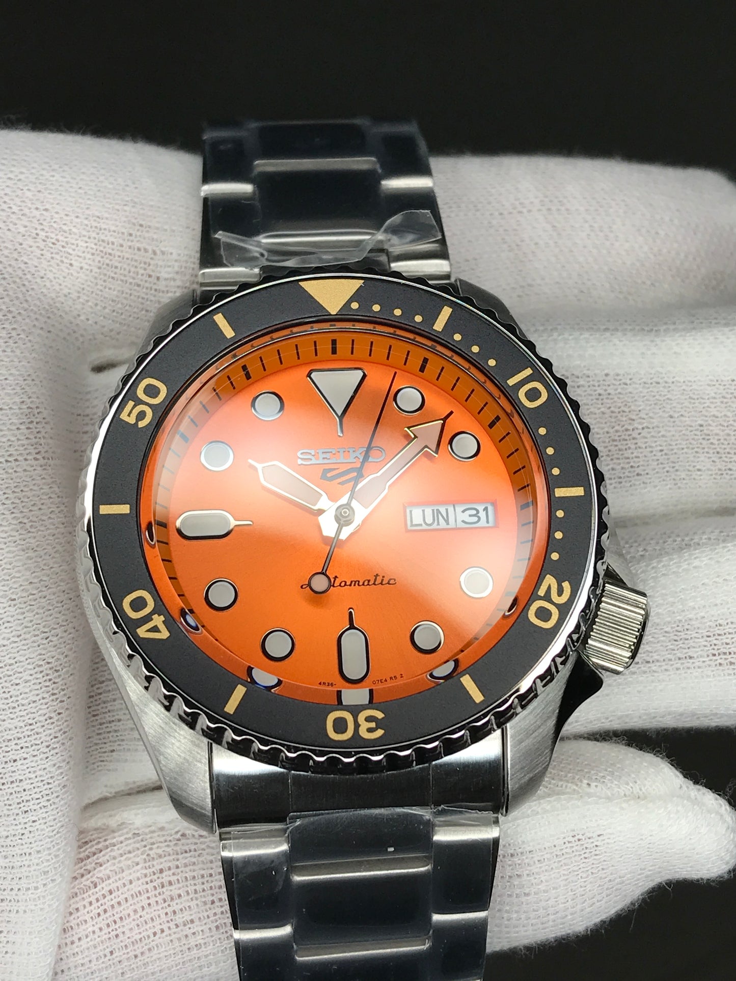Seiko 5 Sports SRPD59K1 Automatic 100m Water Resistant Orange Dial Black Bezel Gents Sports Watch SRPD59